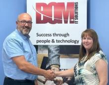 Andy Carter of BOM IT Solutions with Charity Manager Karina Eccles